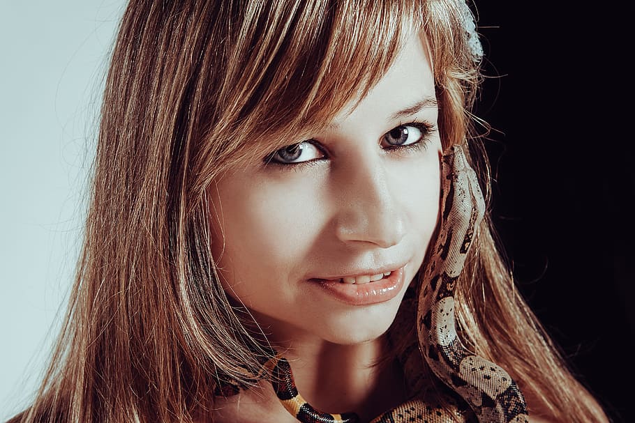 with a snake, boa constrictor, tamer, reptiles, animal, hand