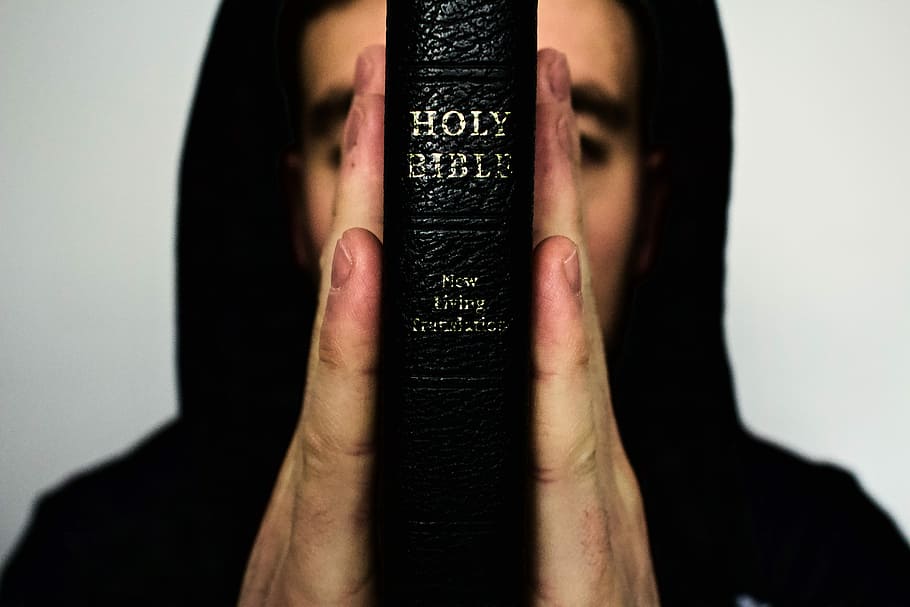 person holding Holy Bible, hands, pray, religion, one person HD wallpaper