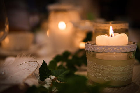 lighted white tealight candle in closeup photography, candlelight HD wallpaper