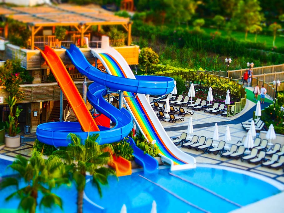 slides, pool, tilt-shift, swimming pool, plant, water, nature HD wallpaper