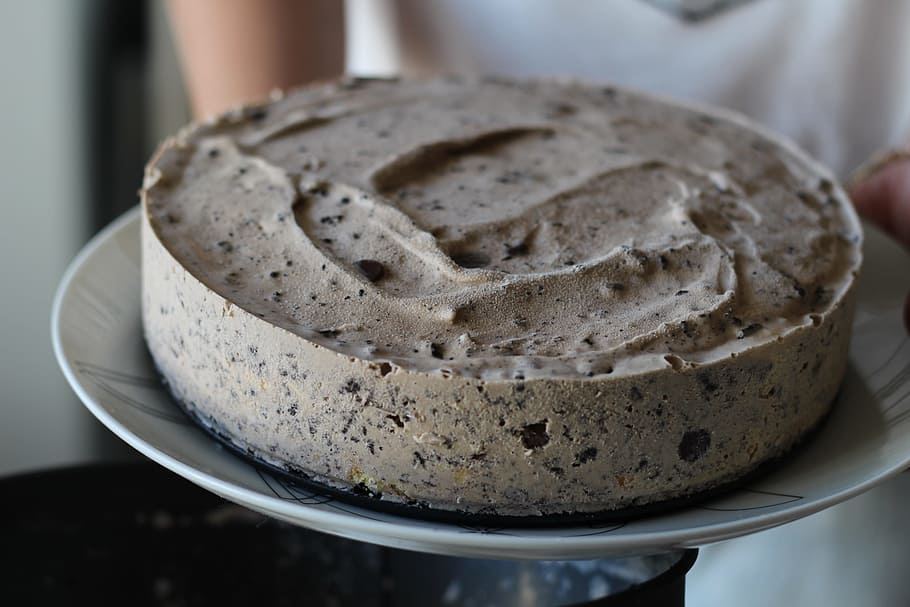 person holding cookies and cream cake served on plate, Chocolate HD wallpaper