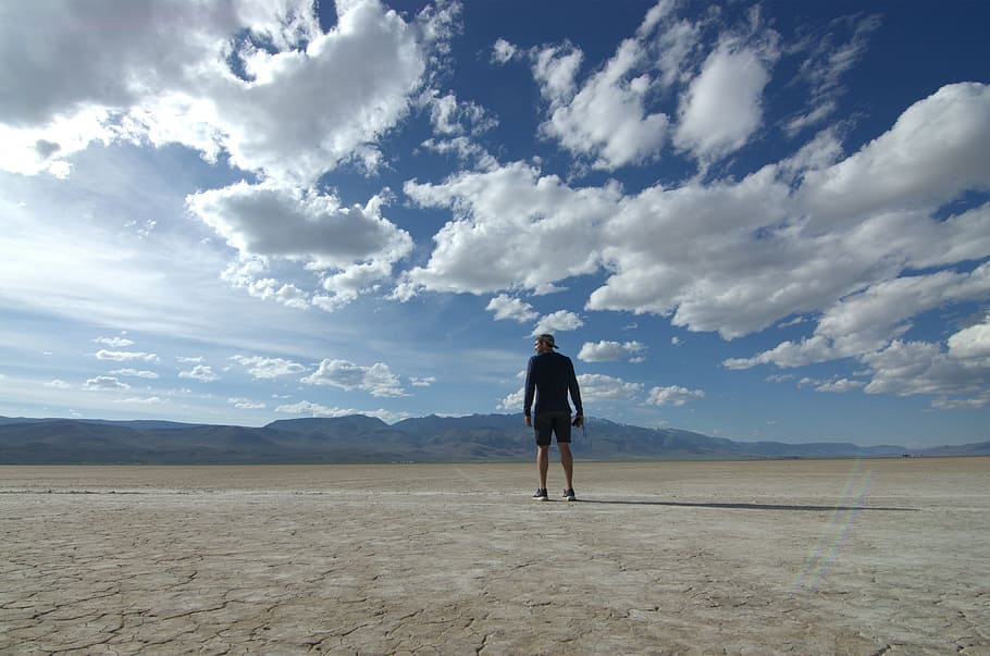 people, man, alone, mountan, sky, blue, clouds, land, sunny HD wallpaper