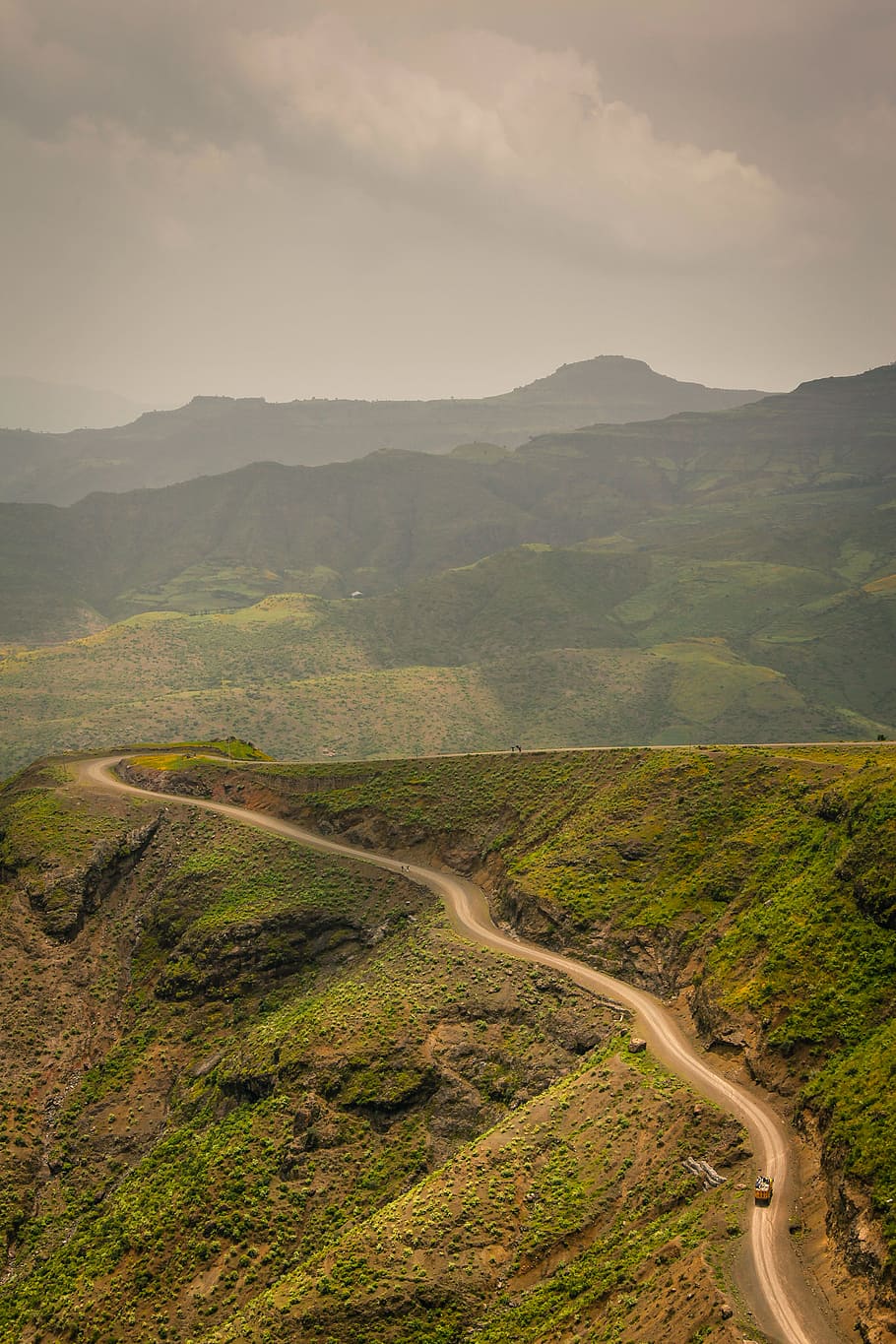 vehicle running on raod during daytime, aerial photography of mountain with road HD wallpaper