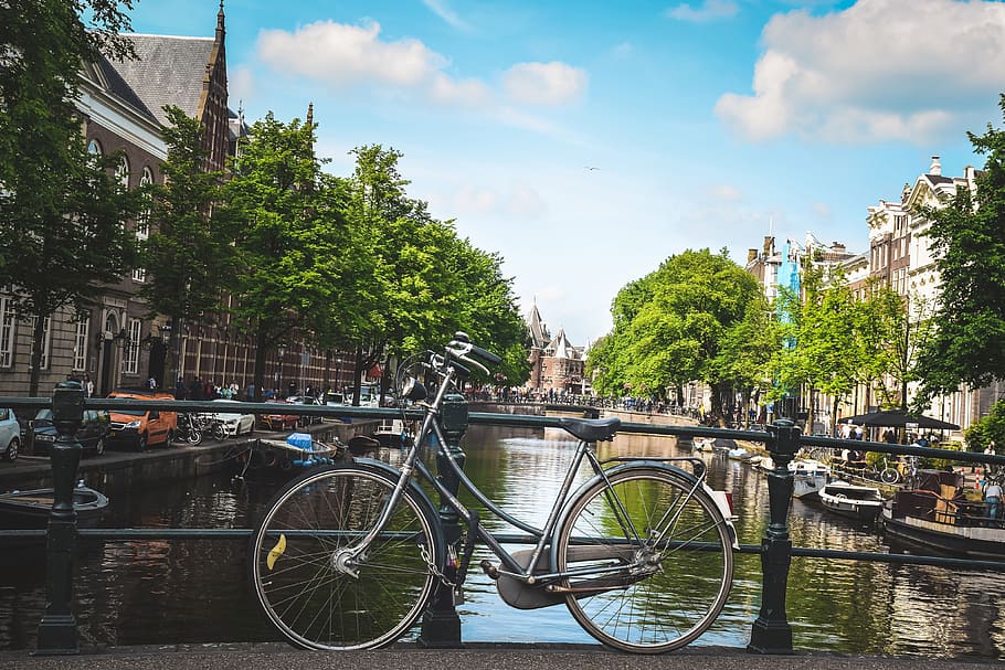 Bicycle by a canal in Amsterdam, Holland, urban, bike, netherlands, HD wallpaper