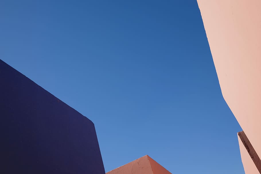 low angle photo of building, low-angle photo of brown building during daytime HD wallpaper