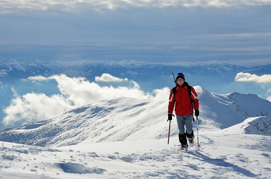 person on snow mountain during daytime, man walking on mountain covered with snow HD wallpaper