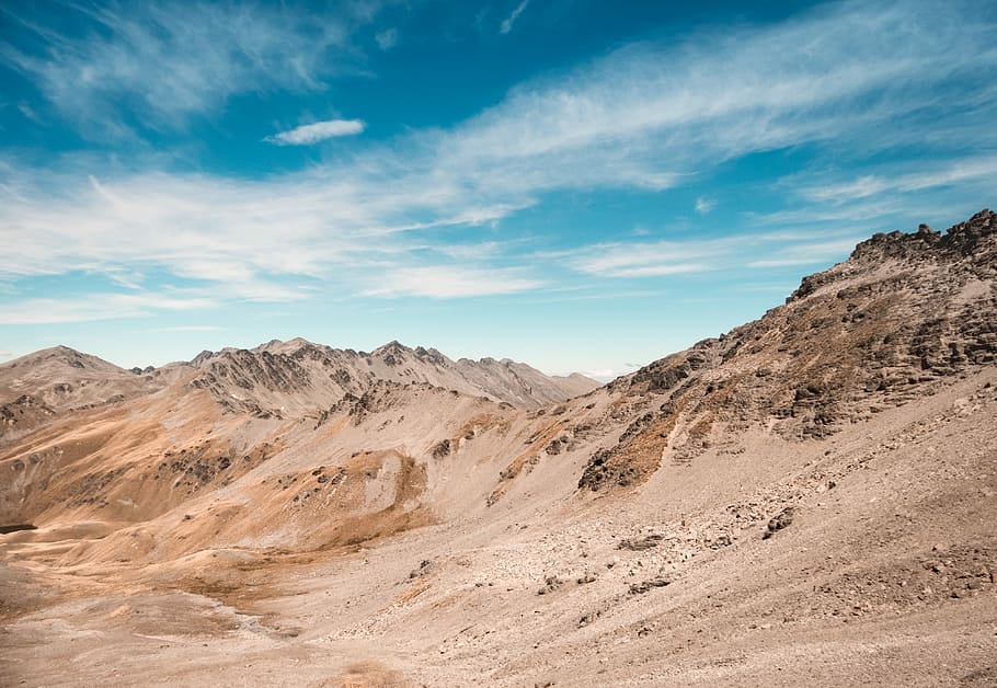 mountain hills under white and blue sky, brown mountain under cloudy sky HD wallpaper