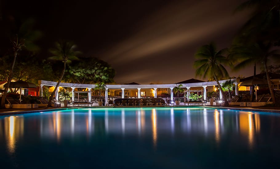 silhouette photo of swimming pool near cottages, white, brown HD wallpaper