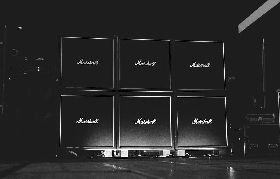 black Marshall speakers, six Marshall guitar speaker cabinets