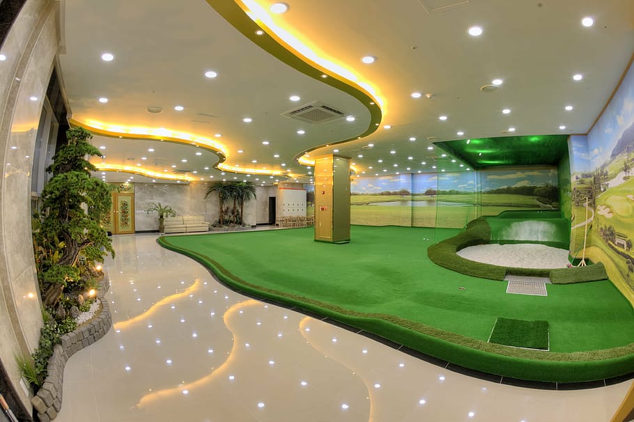 lighted ceiling and green golf mat field, screen golf, putting HD wallpaper