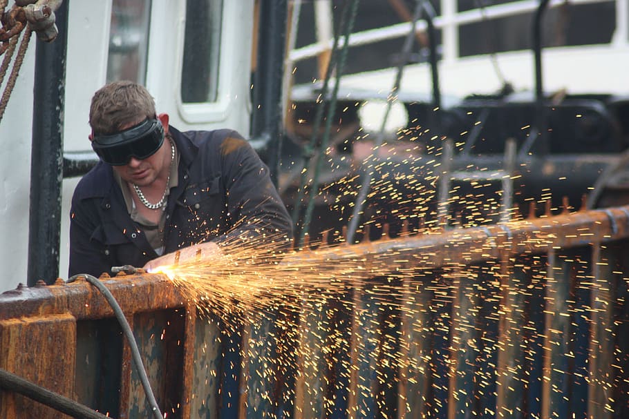man wearing black jacket using power tool, ship, cutting, tools HD wallpaper