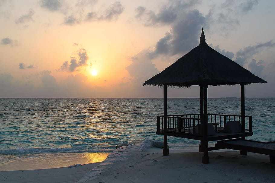 silhouette photo of gazebo near sea during golden hour, blue HD wallpaper