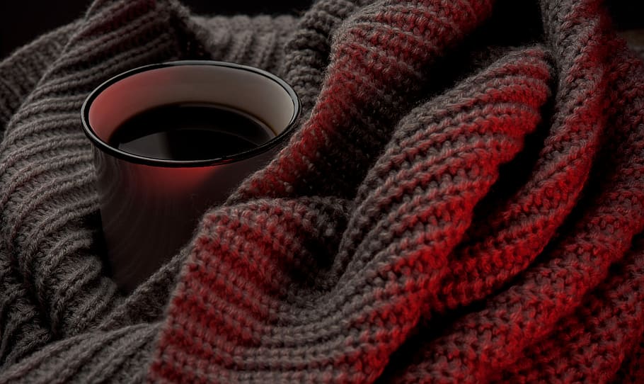 white cup on beige knitted cloth, white mug with black liquid on brown knitted surface HD wallpaper