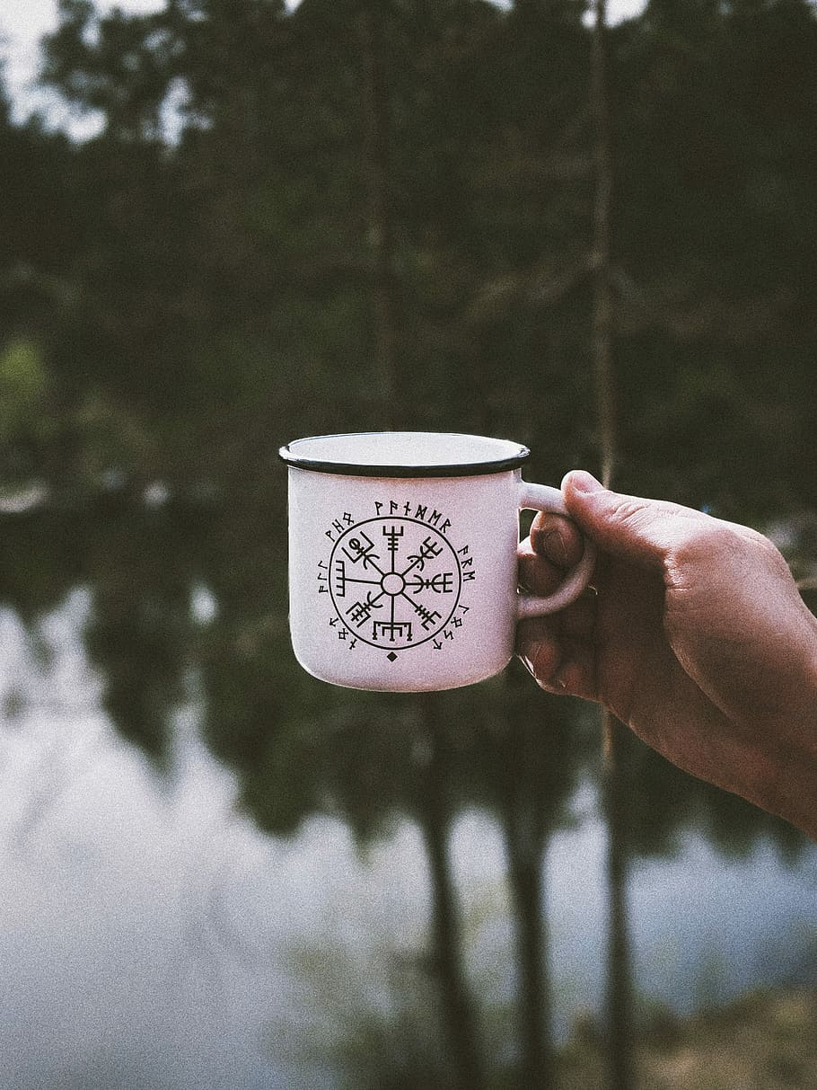 person holding white cup outdoor during daytime, person holding white metal cup HD wallpaper