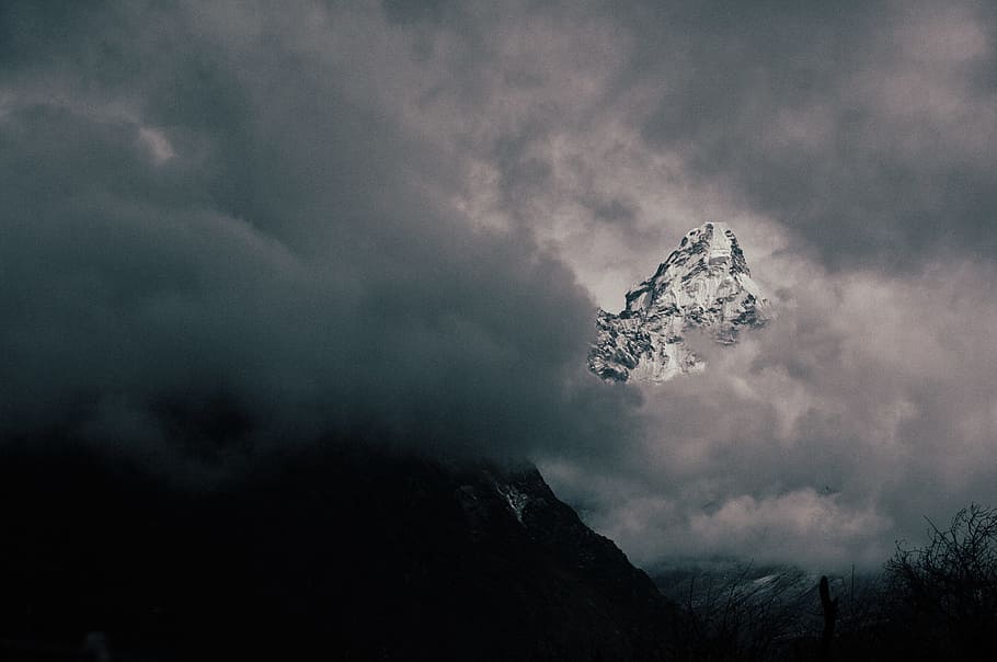 snow covered mountain with clouds, photo of mountain covered with clouds HD wallpaper