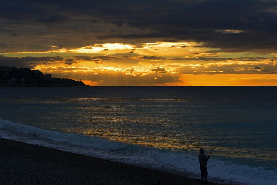 sunset, beach, coast, shore, fishing, person, waves, ocean HD wallpaper