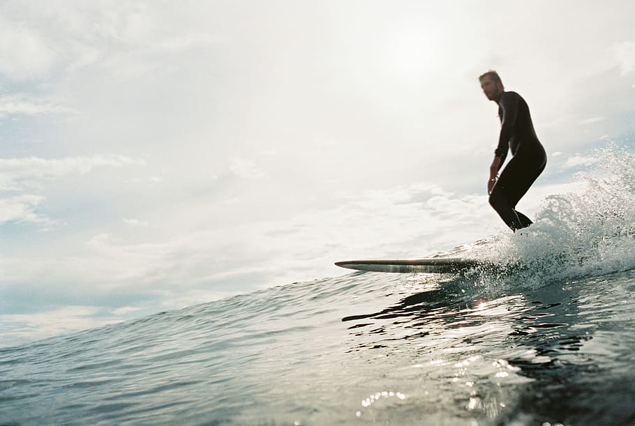 man surfing during daytime, man surfboarding on sea, surfer, ocean, HD wallpaper