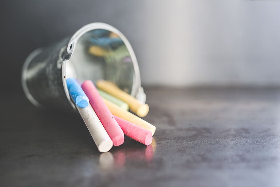 assorted-colored chalk on black table-top, bucket, toy, kids HD wallpaper