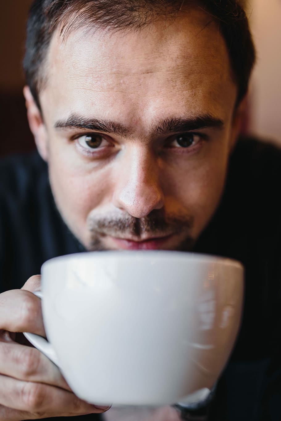 Young Elegantly dressed man sititng in a cafe, caucasian, interior HD wallpaper