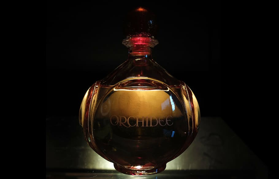 Orchidee bottle close-up photography, perfume, transmitted light, HD wallpaper