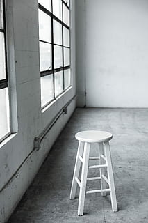 round white wooden stool near closed window, white wooden chair inside room HD wallpaper