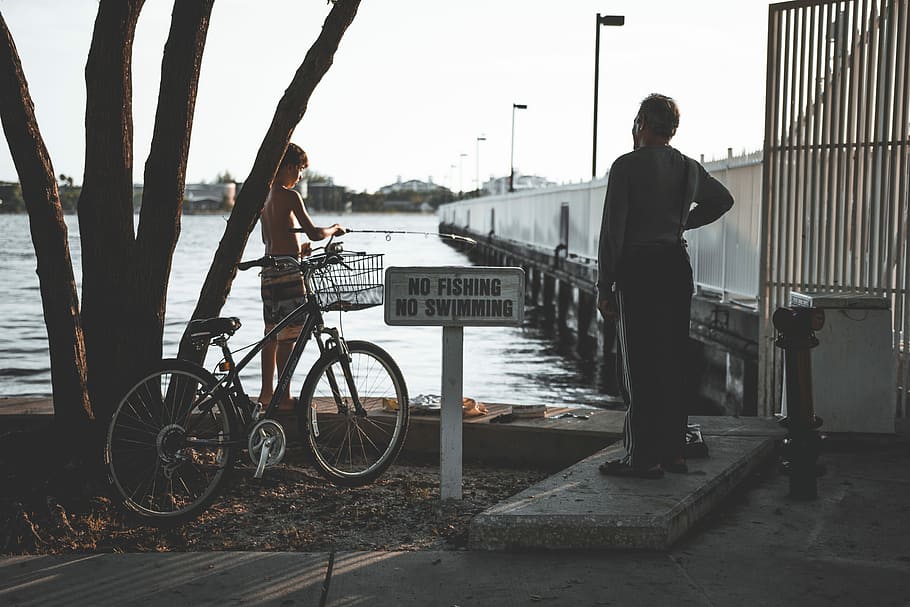NO FISHING -NO PROBLEM, two person standing near dock, beach HD wallpaper