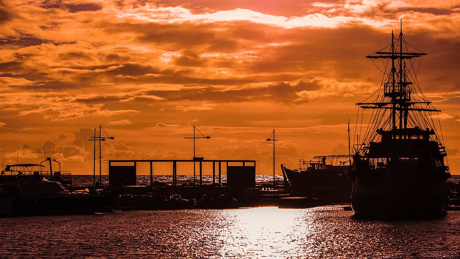 silhouette photography of sailing ship near wharf, sunset, harbor HD wallpaper