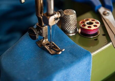 shallow focus of sewing machine with blue textile, couture HD wallpaper