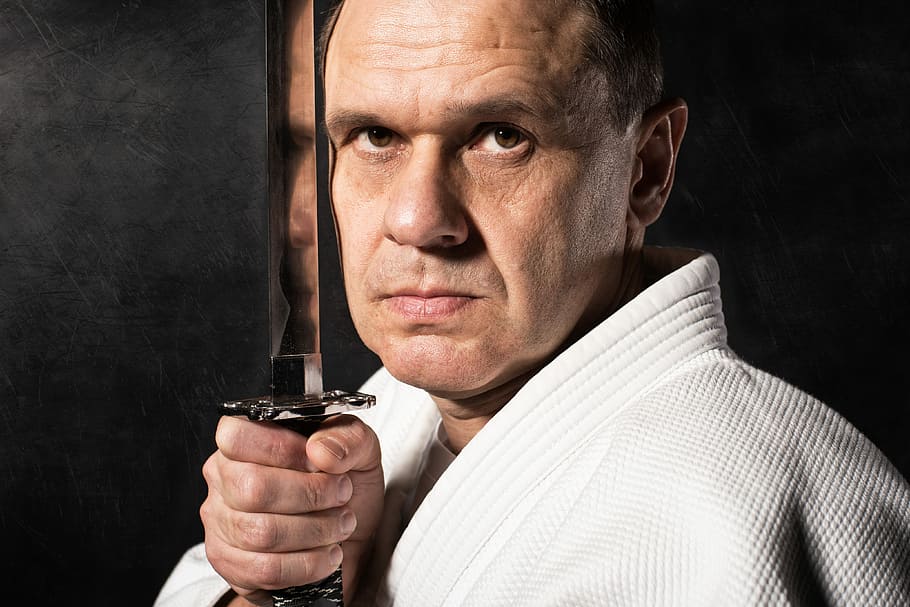 Photosession with katana, man in white top holding katana, male HD wallpaper
