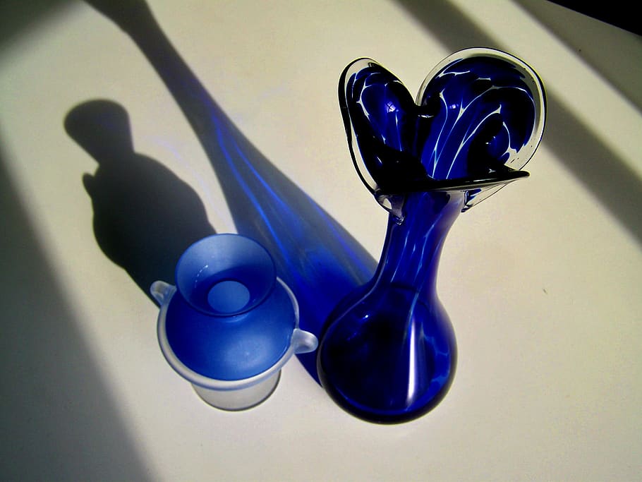 blue glass objects, light shadow, ornaments, indoors, high angle view HD wallpaper