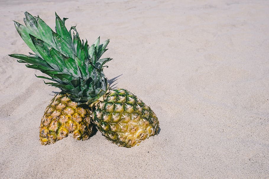 two pineapple fruits on sand, pineapples, beach, summertime HD wallpaper