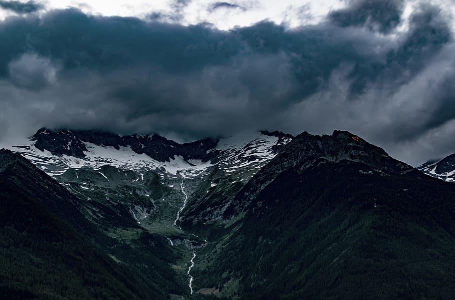 bird's-eye view photography of mountain range under cloudy sky, green mountain under blue and white clouds during daytime HD wallpaper
