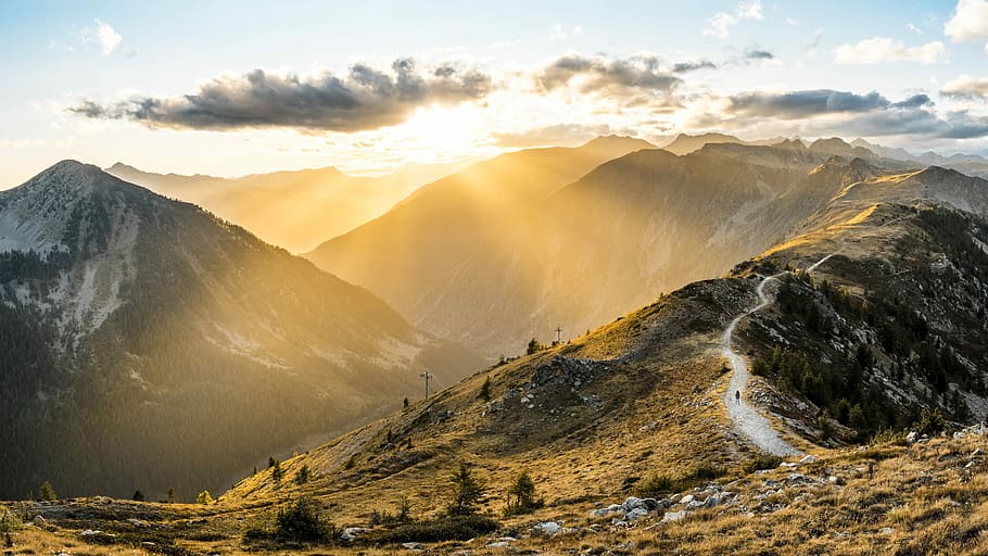 photography of mountain during sunset, trees growing near mountain valley HD wallpaper