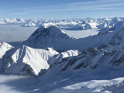 mountain covered by snow, aerial view of snowy mountains, clouds HD wallpaper
