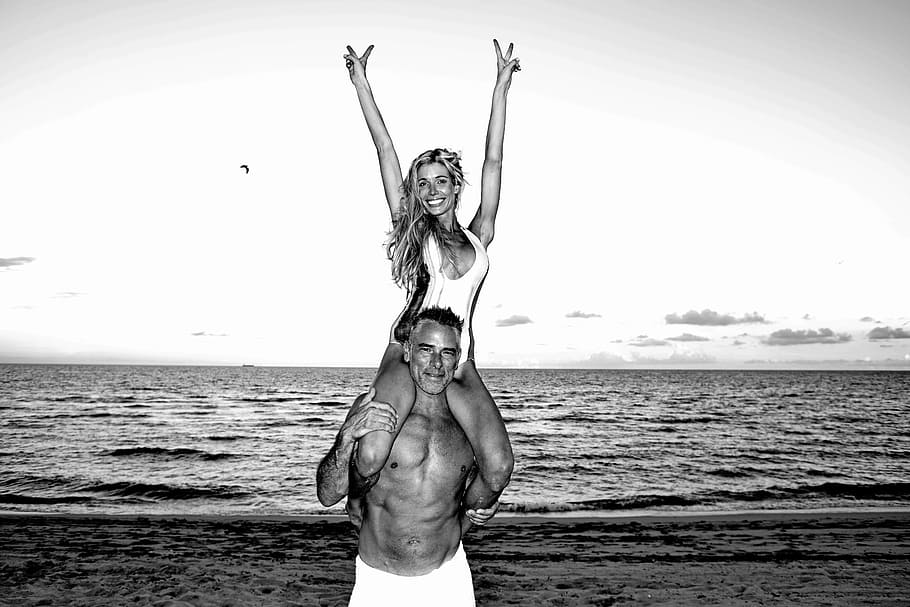 grayscaled photo of man and woman, couple, beach, fun, beach couple, HD wallpaper