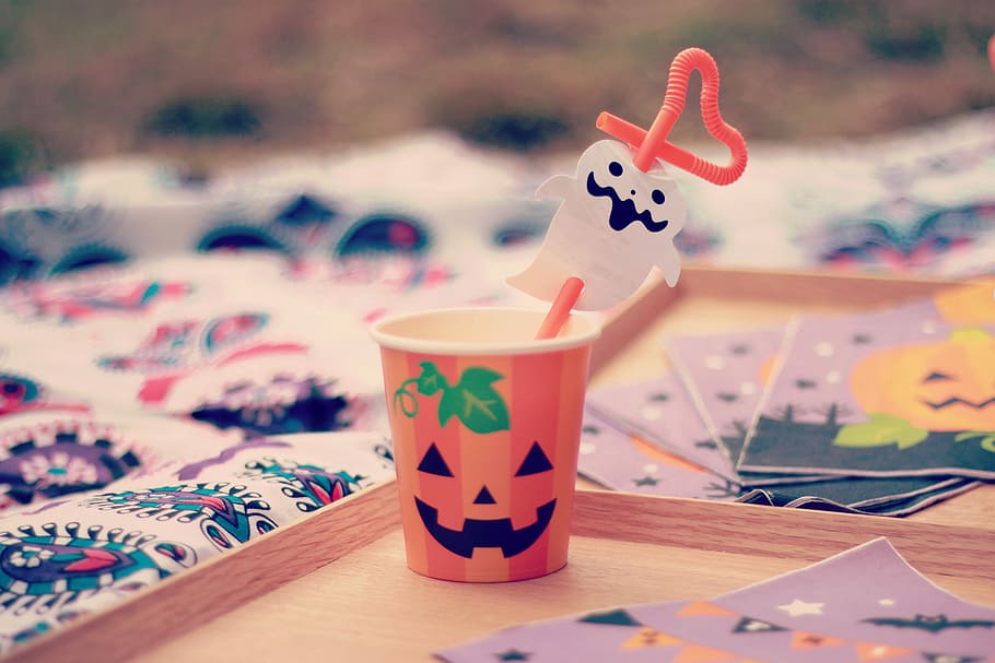 orange and white plastic cup with straw Halloween decorations HD wallpaper