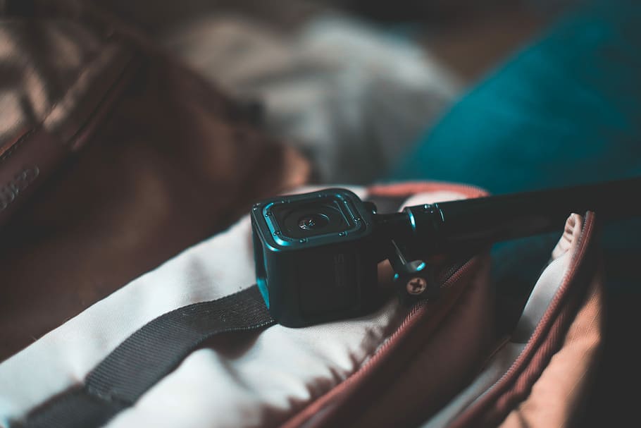 selective focus photography of black webcam, black camera on brown case HD wallpaper