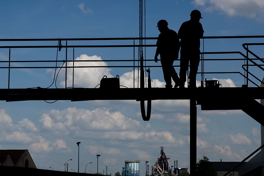 two linemen standing on bridge, construction worker, workers HD wallpaper