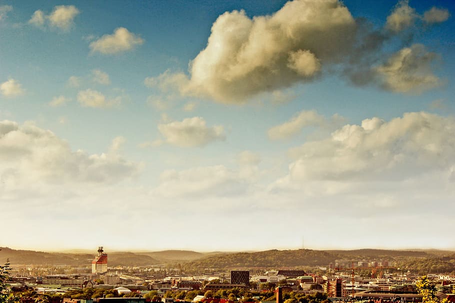 landscape photo village under blue sky, brown, white, clouds HD wallpaper