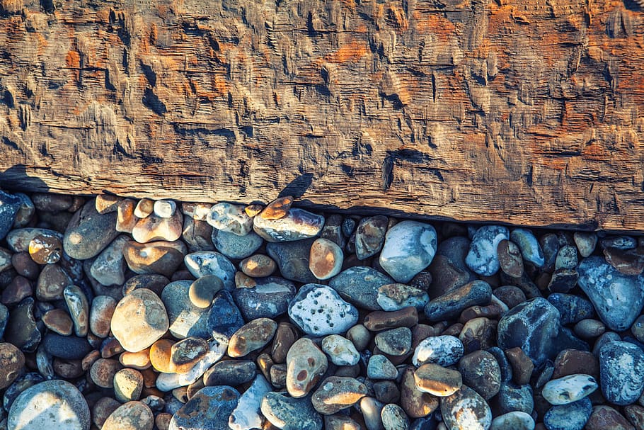This is a shot captured on the beach at Deal In Kent England, the beach pebbles rest beside an old wooden groyne