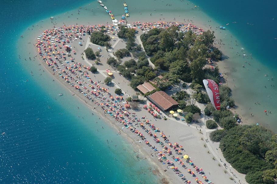 Drone view of a crowded sand beach in Ölüdeniz, Fethiye Blue Lagoon