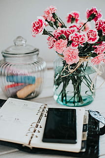 Organizer, mobile phone and lovely pink flowers, workspace, workplace HD wallpaper