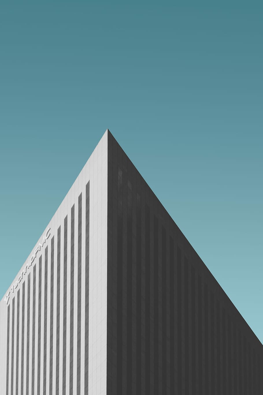 closeup photo of white building, gray high-rise building, minimalism