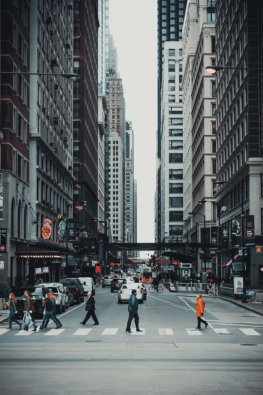 people crossing on gray asphalt road in the city during daytime, people walking on road surrounded building HD wallpaper