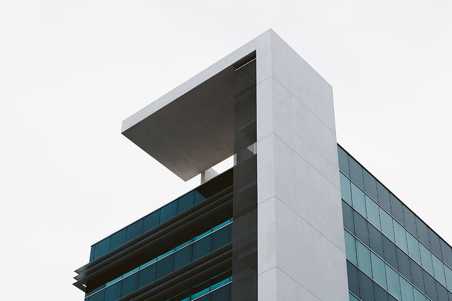 white and black building, worm view of building during daytime HD wallpaper