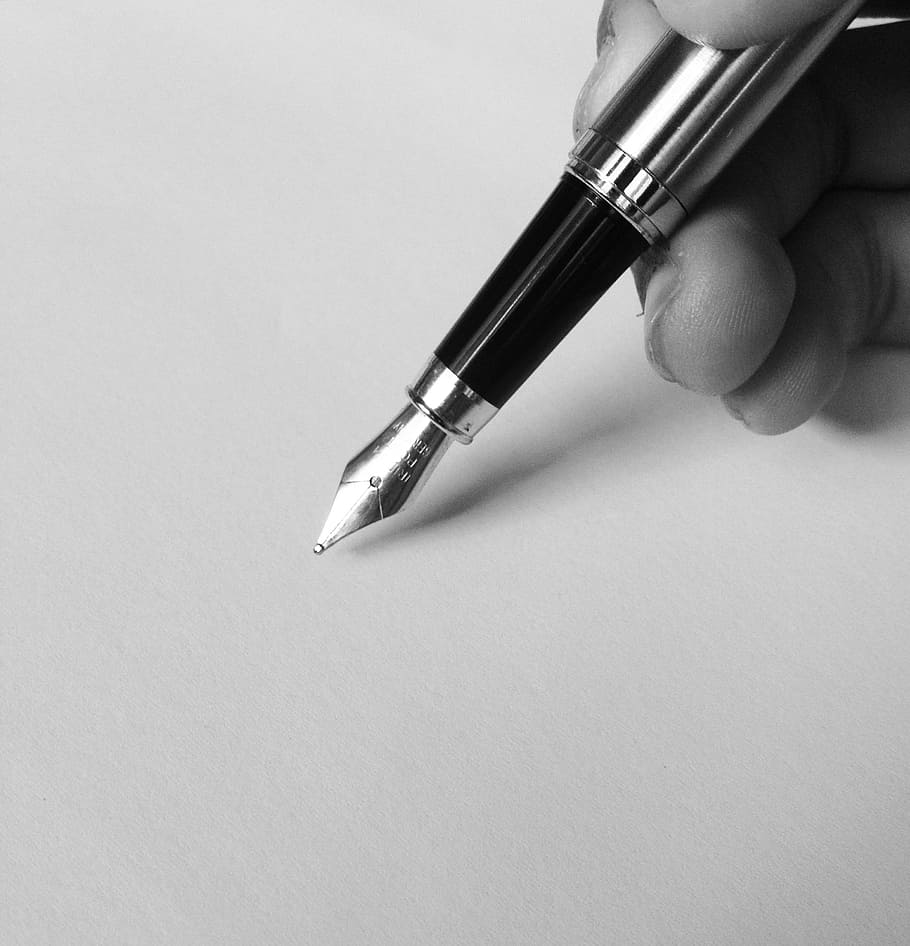 Person Holding Fountain Pen, black and white, black-and-white