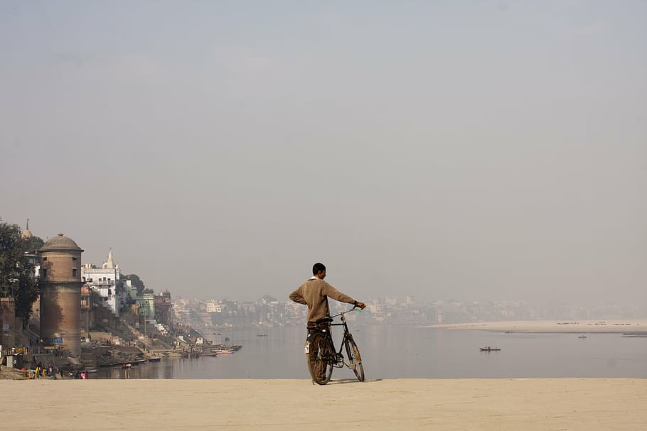 bicycle, bicyclist, bike, buildings, male, man, person, river, HD wallpaper