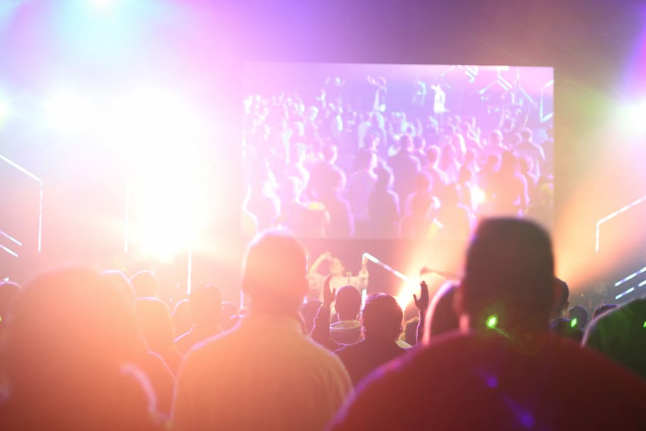 group of people having a party inside dark room with light effects, people gathering in event looking at group people performing on stage, HD wallpaper