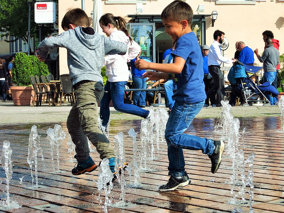 children playing on dancing fountains, water feature, friedrichshafen, HD wallpaper