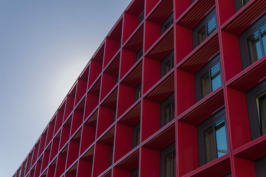 low angle photography of red high-rise building, red and brown painted building HD wallpaper